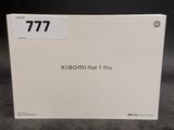 a white box with the number 777 on it sitting on a table