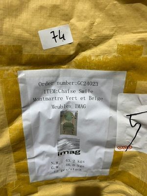 a sign on the back of a chair that has a picture of a man on it