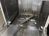 a stainless steel oven that has a star logo on it