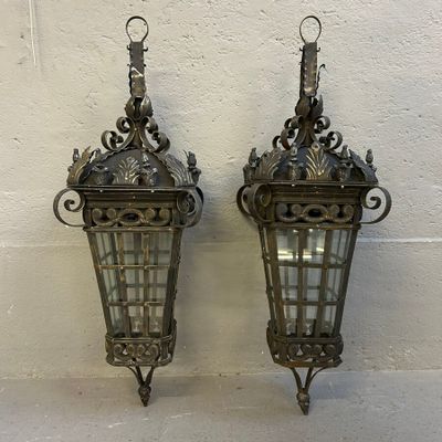 pair of antique brass wall lights with glass panels