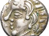 une pièce de monnaie en argent portant l'image d'un visage de femme