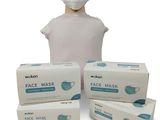 three boxes of face masks and a mannequin head on a white background