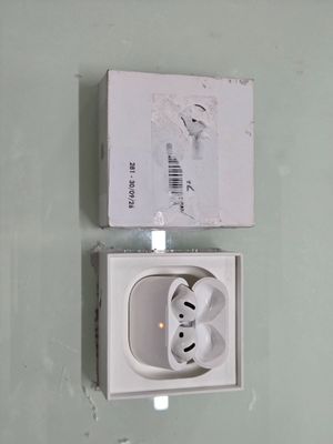 a white box with a pair of earphones in it