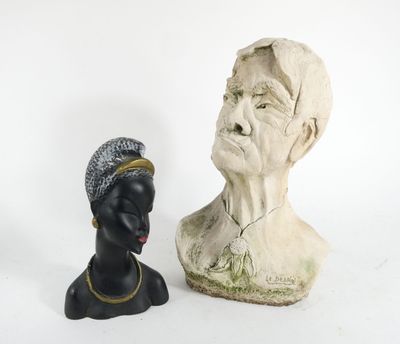 a bust of a woman next to a bust of a man