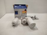 two rolls of toilet paper are sitting next to a box of toilet paper