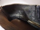 a close up of a pair of shoes with writing on them