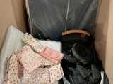 a suitcase that is sitting inside of a cardboard box