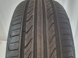 a close up of a car tire on a white surface