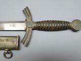 a knife that is laying on top of a table