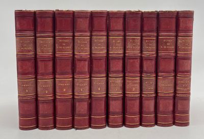 six red books lined up in rows on a white surface