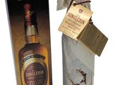 an image of a bottle of single malt whisky next to a package