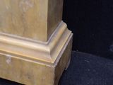 a clock that is sitting on top of a table