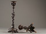 two candles that are sitting on a table