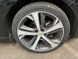 a close up of a tire on a car ' s rim