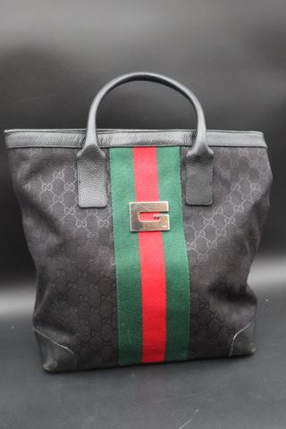 GUCCI – Sac en toile siglé. Bon état
