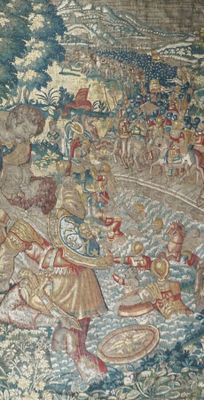 une photo d'une tapisserie sur laquelle figurent un homme et une femme