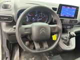 the interior of a car with a steering wheel, dashboard, and dash board