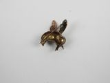 a close up of a small insect on a white surface