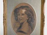 portrait of a woman in a gold frame holding her hand to her face