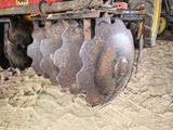 a tractor that is sitting in the dirt