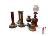 three vases and a lamp on a white background