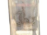 a clear glass with a picture of a clock on it