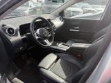 the interior of a car with black leather seats and a steering wheel