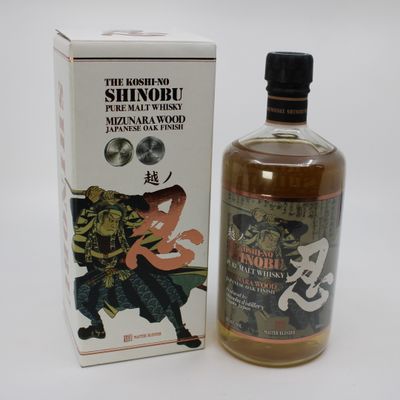 an image of a bottle of japanese whisky next to a box