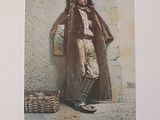 a picture of a man standing in front of a wall