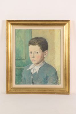 portrait of a young boy in a blue sweater and white collared shirt