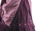an image of a woman in a purple dress on a white background