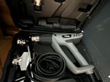 a picture of a gun and other items in a case