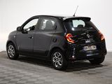 a picture of a small black car parked in a room