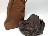 a brown bag and a brown bag on a white background