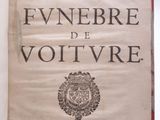 an old book with a picture of a coat of arms on it