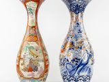 pair of chinese vases on a white background with a white background
