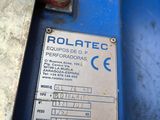 a sign on the side of a blue machine