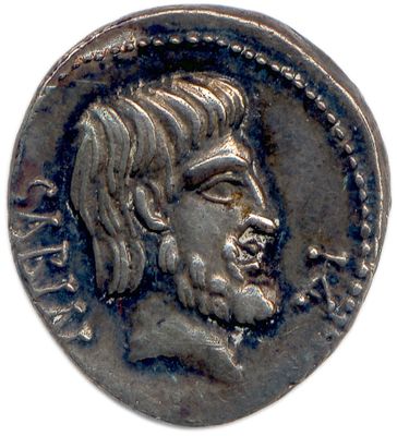 une pièce d'argent portant l'image d'un homme