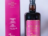 an image of a bottle of whisky next to a pink box