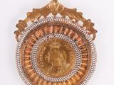 an image of a gold coin with a crown on it