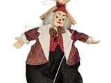 an image of a doll with a wooden cross on top of it