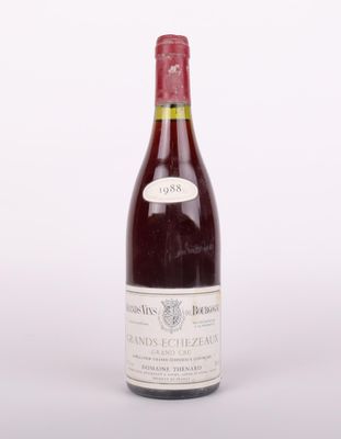 a bottle of wine that is sitting on a table