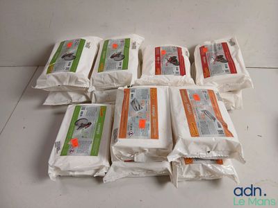 many bags of rice sitting on a counter top