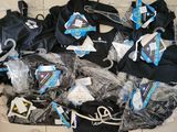 a lot of clothes that are on the floor