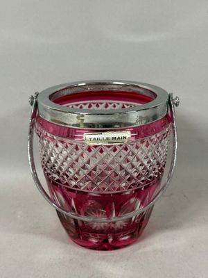 purple glass ice bucket with handle on white background