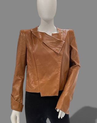 an image of a mannequin mannequin wearing a brown leather jacket