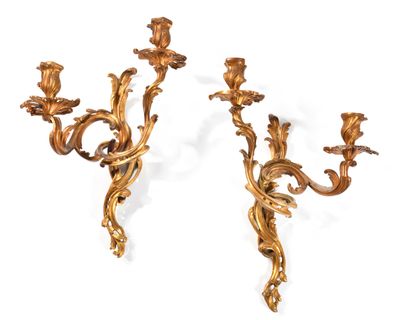 pair of antique gold leaf sconces on a white background