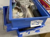 a blue box with a lot of items in it