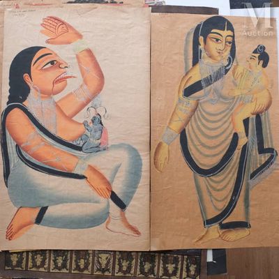 two paintings of a man and a woman hanging on a wall