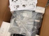 a cardboard box with a bunch of electronics inside of it